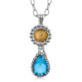 18K Yellow Gold and Sterling Silver Pendant with Teardrop Blue Topaz Accent